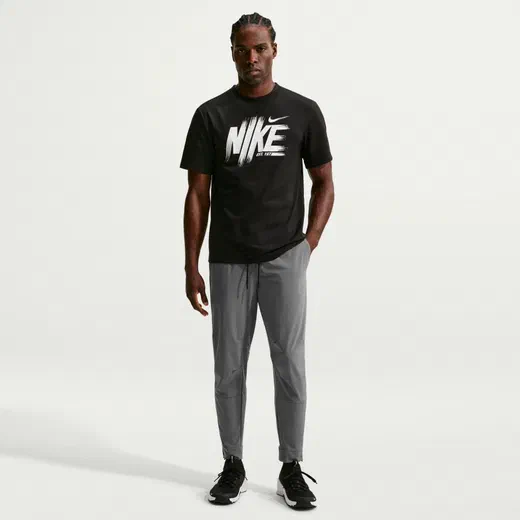 Pantalon survêtement Nike Unlimited gris
