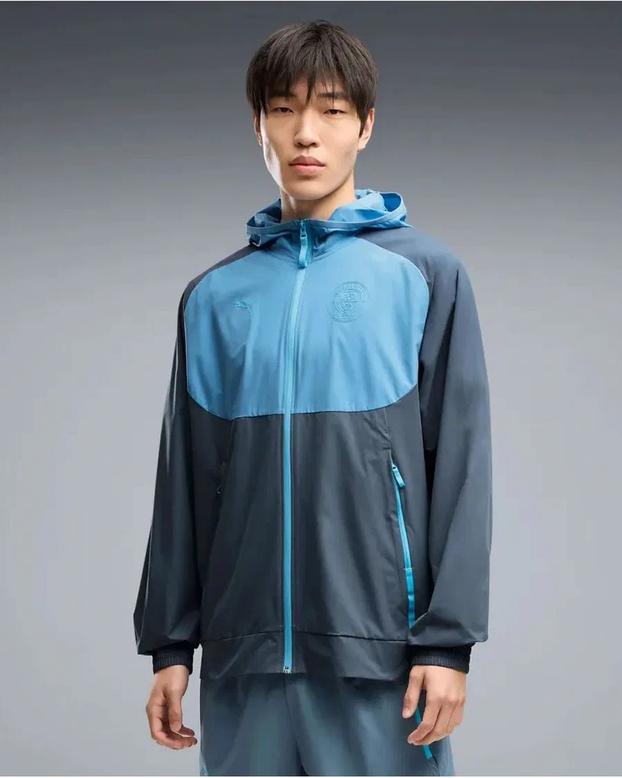 Mannequin en veste tissée PUMATECH de Manchester City, bleu ardoise avec plastron bleu ciel